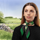 Woman wearing a floral scarf with a green field and hills in the background, Buxton